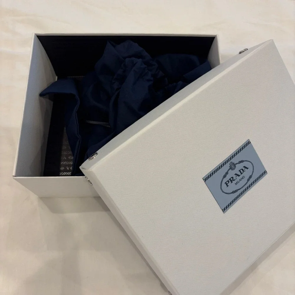 Prada Natural Straw Visor with Gold Triangle Logo